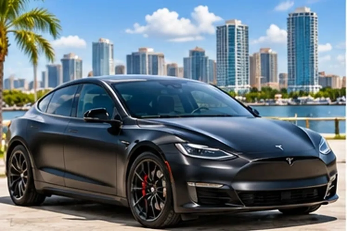 Matte gray wrapped Tesla sedan by the San Diego waterfront